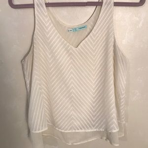 Maurice’s white tank top